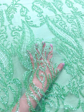 Dantela Couture Mentazöld Geometriai mintával, gyöngyökkel és flitterekkel